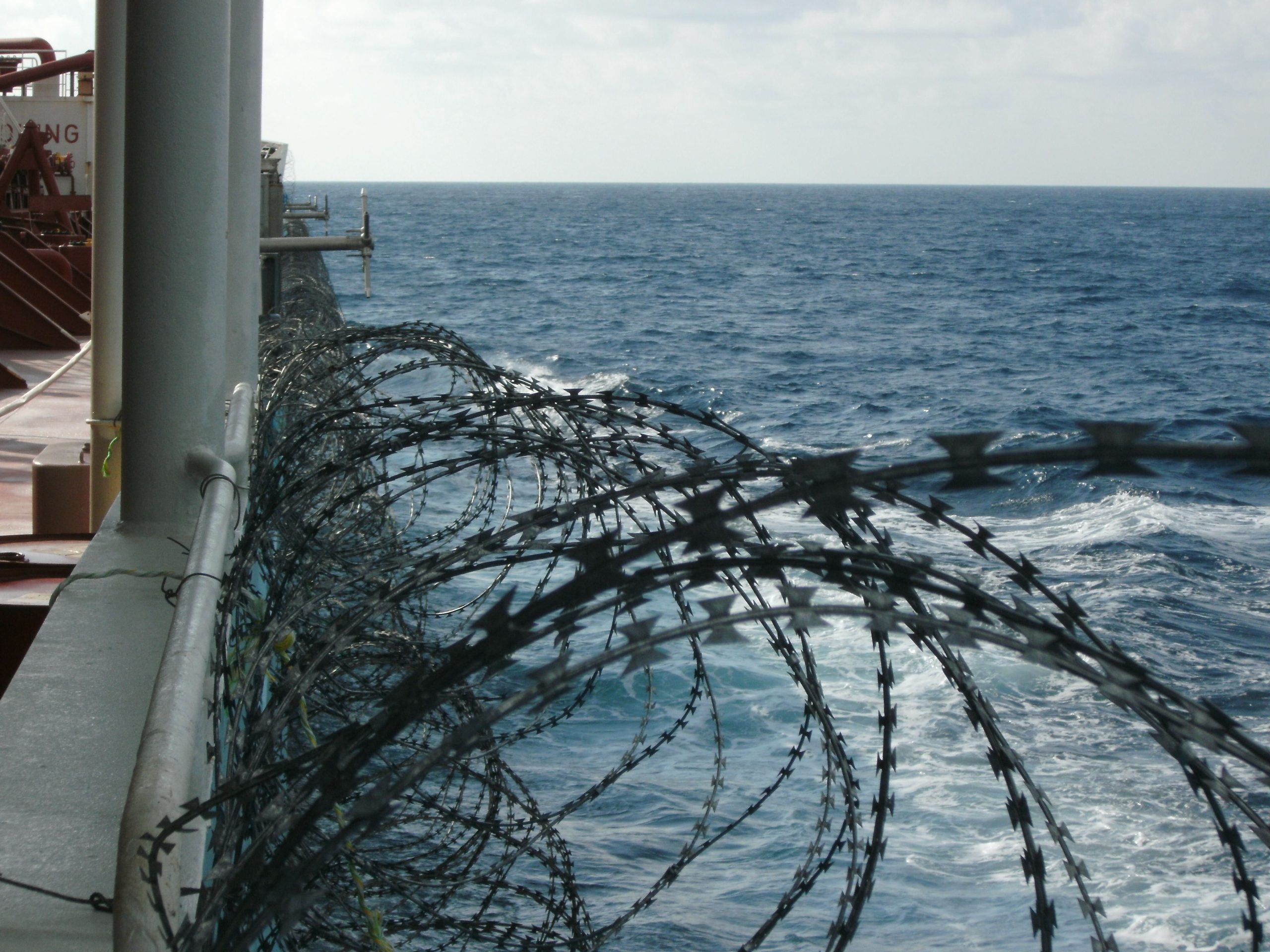 Gulf of Aden Anti-piracy razor wire and cannons. Voyage off the coast of Somalia.